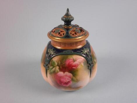 A "Hadley's" Worcester vase and cover decorated with posies<br