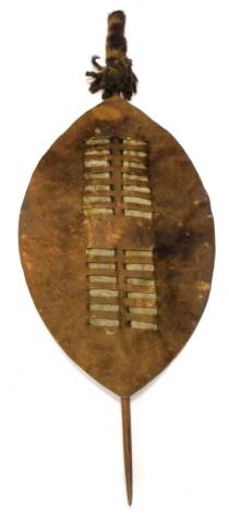A Zulu type hide shield, with wooden pole and hide handle, 125cm H.