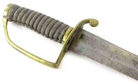 An 1850 pattern police officer's cutlass, with a curved blade, leather and brass scabbard and a shagreen handle, 78cm L.