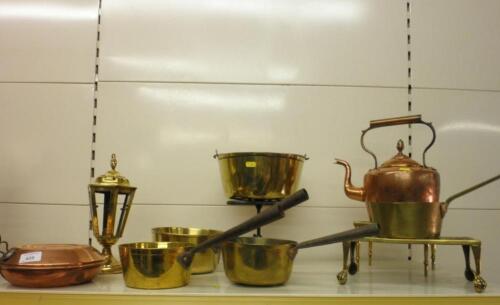 Four brass pans, a preserve pan, two brass trivets, a small bed