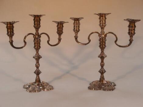 A pair of silver two-branch three-light table candelabra by Garrard & Co.