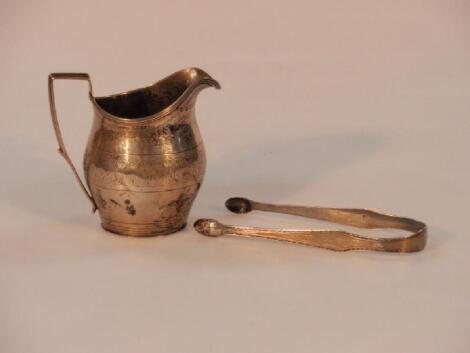 A George III silver helmet cream jug