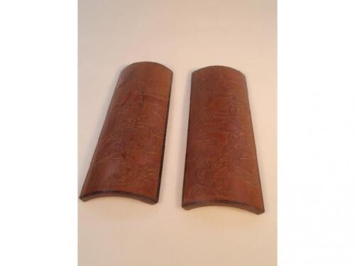 A pair of Chinese carved bamboo wrist rests by Dong Shouping