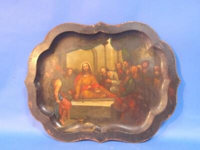 A XIX century tole ware serving tray painted with a scene of