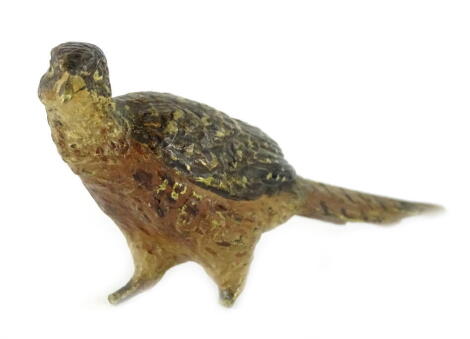 An early 20thC bronze model of a pheasant, in the manner of Bergman, (AF), 12cm L.