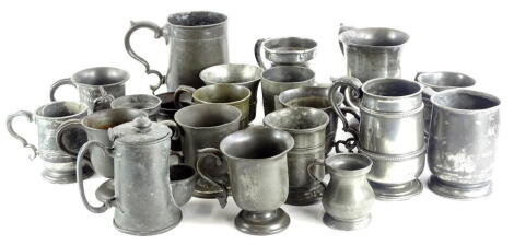 Various 19thC pewter tankards, mainly with a shaped foot, etc.