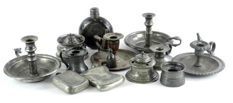 A collection of 19thC and later pewter, to include chamber sticks, flasks, inkwells, etc.