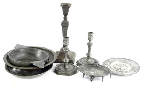 A pair of late 18th/early 19thC continental pewter candlesticks, each with a canted square base and various touch marks, another candlestick, novelty centrepiece, and electro type dish, etc.