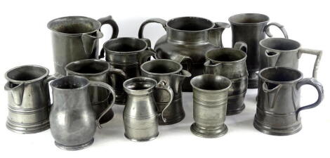 Miscellaneous 19thC and later pewter jugs, to include a number examples with side handles, etc.