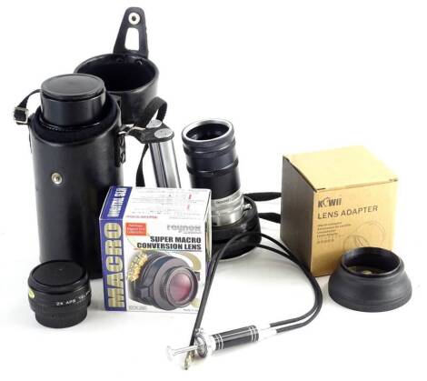 A small enlarger or lens accessory, bearing the name Novoflex and other lens accessories.