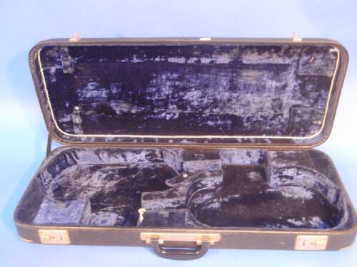 A twin violin case with blue velvet lining