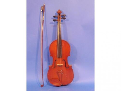 A 20thC Viola, bears a Chinese label, with bow in a fitted case