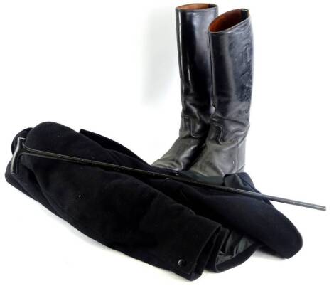 A pair of black leather size 9 riding boots, an ebonised walking cane and a black Saddle Master riding jacket.
