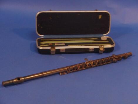 A flute "The Edgware" by Boosey and Hawkes London. No 360239