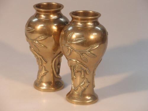 A pair of early 20th century Chinese cast brass baluster vases