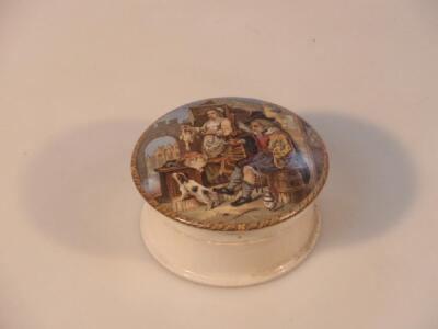 A Pratt ware pot lid painted in colours with a man smoking a clay pipe by a poultry stall