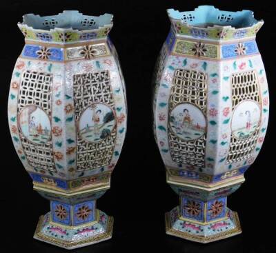 A fine pair of Chinese reticulated porcelain table lanterns, each of octagonal globular form, the bodies partially pierced and set with hand painted panels of figures in exterior settings, to include a lady dressed in finery, surrounded by floral border, - 2