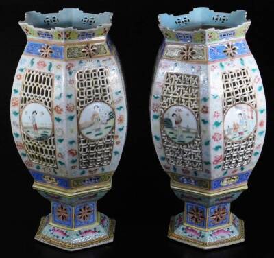 A fine pair of Chinese reticulated porcelain table lanterns, each of octagonal globular form, the bodies partially pierced and set with hand painted panels of figures in exterior settings, to include a lady dressed in finery, surrounded by floral border, - 3