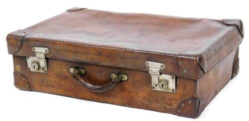 An early 20thC pig skin travel case, of rectangular form, with Drew & Sons Piccadilly double lever locks and articulated handle, with studded base, 66cm W.