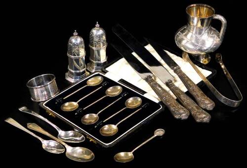 Various silver and related effects, part cruet set, teaspoons, silver handled knifes, sugar bows, cased spoons, etc. various dates and makers, approx. 10oz of silver. (a quantity)