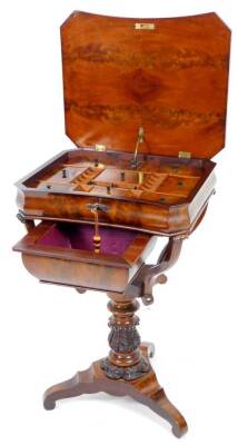 A mid 19thC mahogany sewing table, the inverted rectangular canted top with a flame quarter veneer, revealing various interior lidded and open sections, above a heavily carved acanthus leaf stem, on a tricorn platform base terminating in scroll feet, c184 - 2