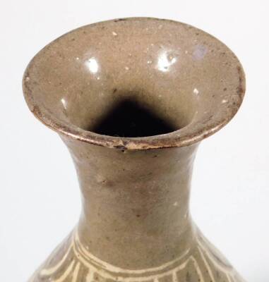 A Korean type pottery Buncheong design vase, stamped with a repeat floral pattern with an upper flower and orb decoration, on circular foot, glazed in cream and brown, 23cm H. - 3