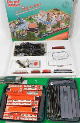 A Jouef HO-scale train set, in fitted box and various other Hornby ACHO and other Jouef boxed locomotives, carriages, rolling stock, etc. (a quantity, some loose and boxed)