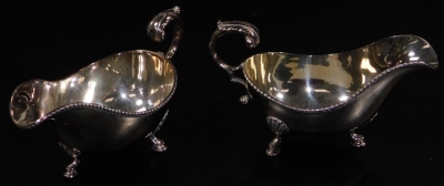 Various silver plated ware, to include an oval tea tray of part gadrooned outline with pierced handles, 49cm W, a pair of three branch candelabra, sauce boats, part tea service, etc. (a quantity) - 4