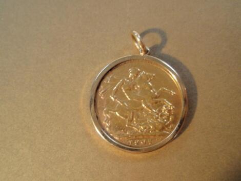 A full sovereign 1907 in a 9ct gold channel pendant mount