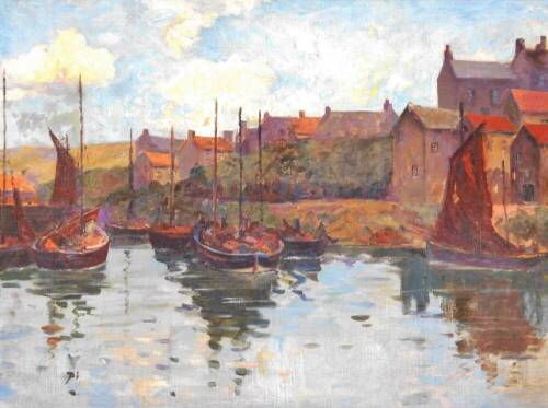 Early 20thC English School, boats drying sails on a stream before buildings with clouds gathering on a summer's day, oil on board, unsigned, 52cm x 72cm.