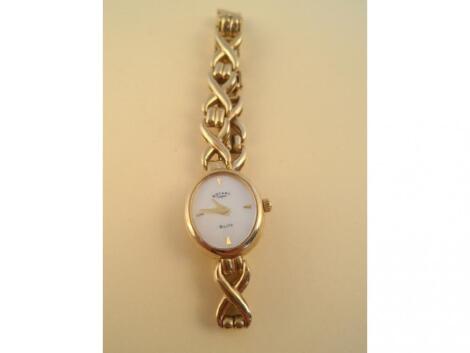 A ladies Rotary 9ct gold bracelet wristwatch with oval mother of pearl dial