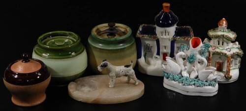 Various collectable items, to include a cold painted dog ashtray, 19cm W, a Staffordshire swan spill vase, three various tobacco jars, other Staffordshire pottery, etc. (a quantity)