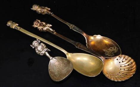 An silver plated Lincoln Imp sifter spoon, 15cm H and three other Lincoln Imp plated spoons. (4)