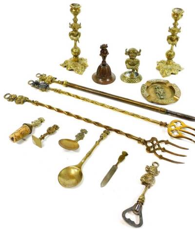 Various Lincoln related brass ware, to include a pair of candlesticks, 19cm H, caddy spoon, ashtray, cork stopper, various other ornaments, fireside companion set, etc. many with Lincoln Imp crest. (a quantity)