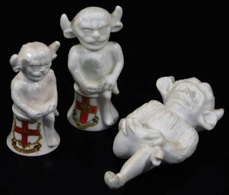 A Parian Goss type figure of The Lincoln Imp, 14cm H and two crested figures of The Lincoln Imp to include Arcadian. (3)