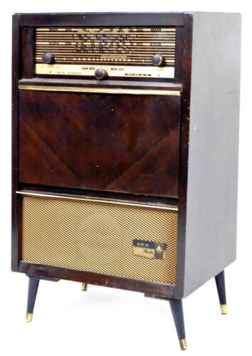 A mid 20thC ACE radiogram, in a rectangular cabinet, on turned legs with front tuning knops and grill speaker beneath, 82cm H, 49cm W, 33cm D.