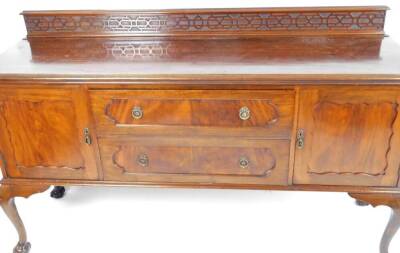 An Edwardian mahogany sideboard, with a blind fret gallery raised above two drawers flanked by panelled cupboards on cabriole legs terminating in claw and ball feet, 116cm H, 183cm W, 53cm D. - 2