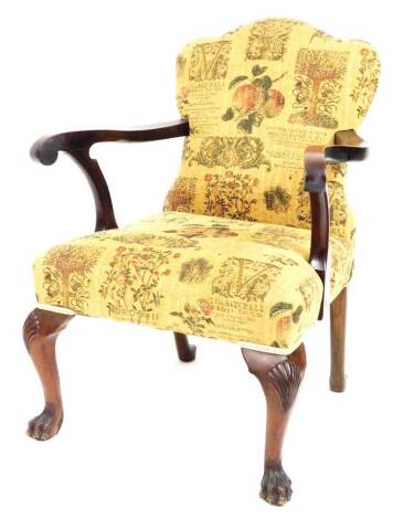 A 19thC mahogany framed armchair, with shaped cresting rail and deep seat overstuffed in later material, with shaped arms and cabriole claw and ball front and pad back legs, 99cm H.