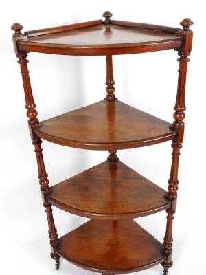 A Victorian mahogany corner whatnot, the shaped shelves broken by carved reeded columns, on turned feet terminating in castors, with a low gallery to the top, 126cm H, 63cm W, 46cm D. - 2
