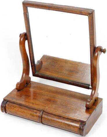 A Victorian mahogany table mirror, the rectangular glass flanked by sabre stiles, on a platform base with two cushion front drawers, 62cm H, 55cm W, 29cm D.