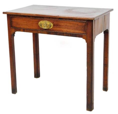 An early 19thC mahogany side table, the rectangular top raised above a cockbeaded drawer with oval plate back handle, on square legs, 70cm H, 76cm W, 45cm D.