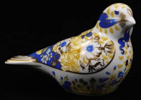 A Royal Crown Derby bird paperweight ornament, Guild figure with gilt stopper, 7cm H. (boxed)