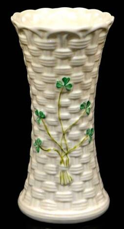 A Belleek porcelain Colleen pattern vase, of inverted circular form, decorated with clover, 15cm H. (boxed)