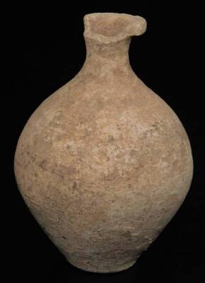 A hand thrown terracotta vessel, probably early terracotta, 11cm Dia., various other Roman bowls, a bulbous vase and a Roman style oil lamp. (4) - 8