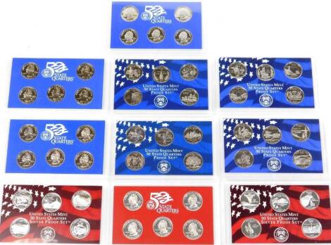 A cased set of United States Mint Fifty State Quarters proof sets. (10 in one box with some paperwork)