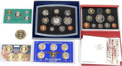 Various coin sets, Royal Mint GB 2000, 1997 GB coin set, 2007 United States Mint Presidential Dollar proof set, mint proof set 1996, a silver Clad Collection JFK Anniversary Silver Dollar set, to include 1965, 1966, 1967, etc. in outer packaging, a Ronald