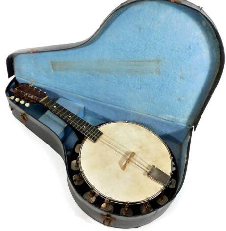 An early 20thC banjo, with circular centre, turned sound adjustors and chrome plated mounts, in case, 62cm W.