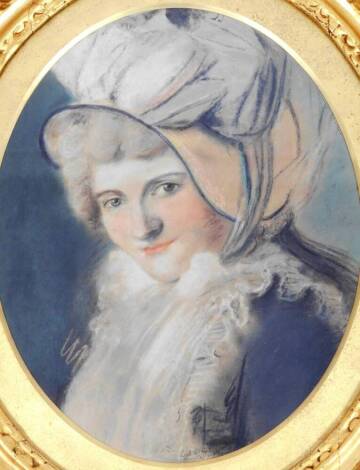 W E (19thC English School). An oval portrait of a lady, quarter profile wearing bonnet, pastel, indistinct title Lond R H, 49cm x 38cm.