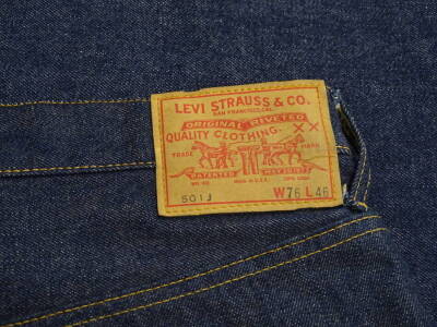 A large oversized pair of Levi 501 vintage jeans, with original untouched labels to reverse stating size 76 waist and 46 leg. Provenance: Gifted to the owners father in the late 1960's by Levi's to use as promotional material when opening the first Levi a - 2