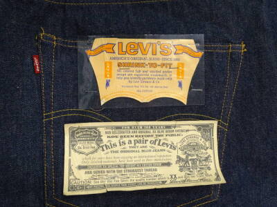 A large oversized pair of Levi 501 vintage jeans, with original untouched labels to reverse stating size 76 waist and 46 leg. Provenance: Gifted to the owners father in the late 1960's by Levi's to use as promotional material when opening the first Levi a - 3